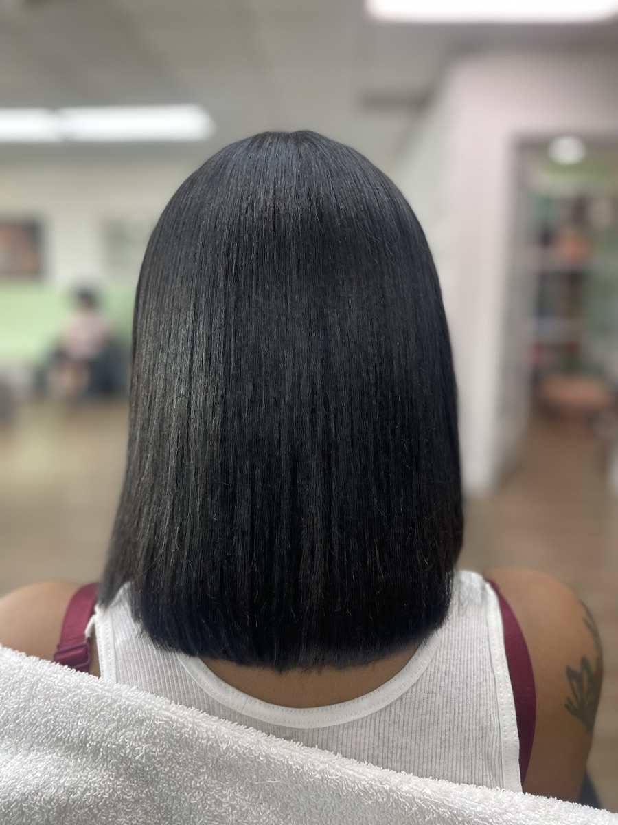 Smooth, polished black bob blowout at Rosy Dominican Hair Spa